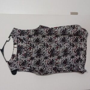 Silky summer blouse size 2 fits like a large. Gently worn , like new.